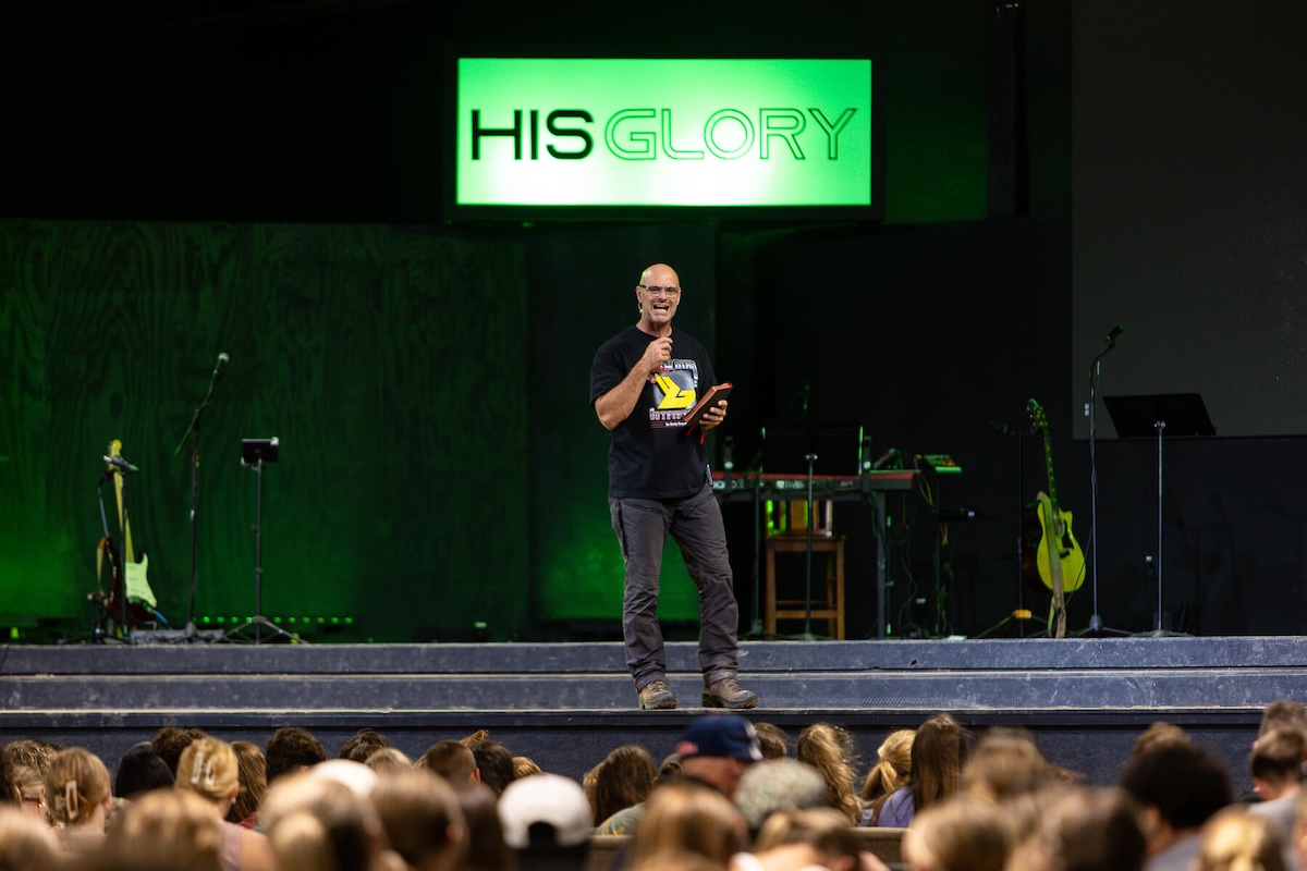 Brody Holloway preaching at Summer Camp