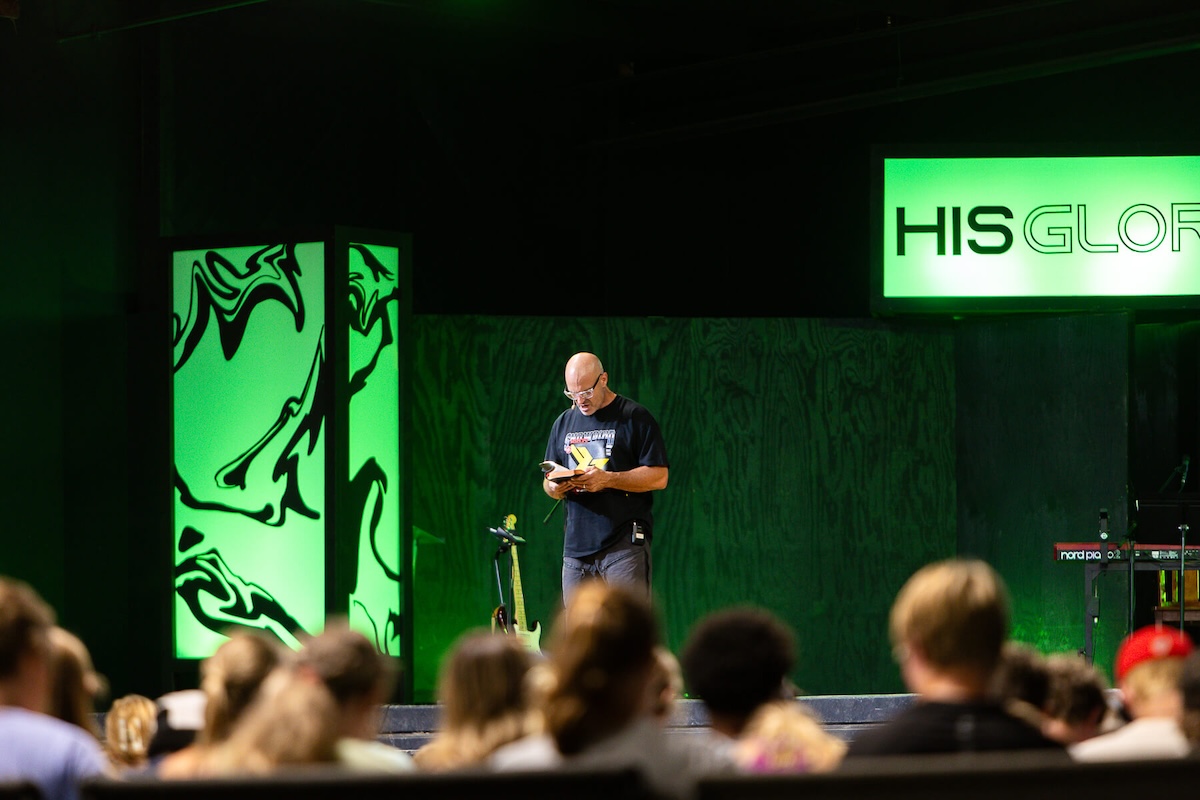 Brody Holloway preaching at Summer Camp